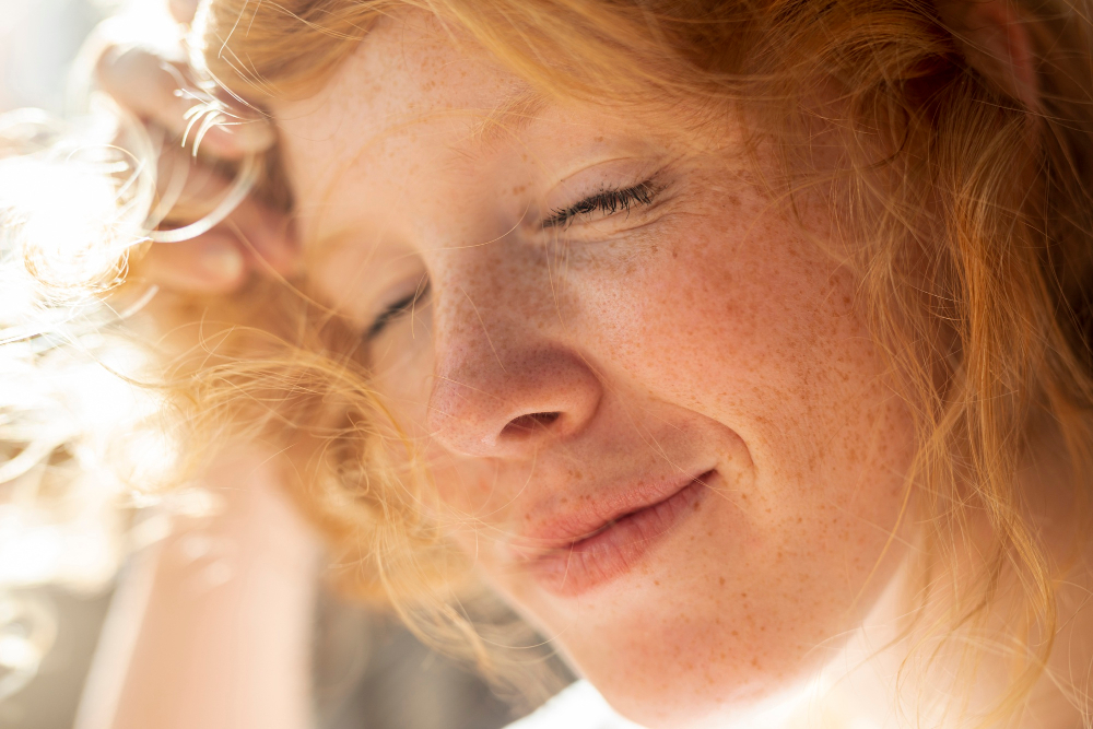 close-up-redhead-woman-with-closed-eyes