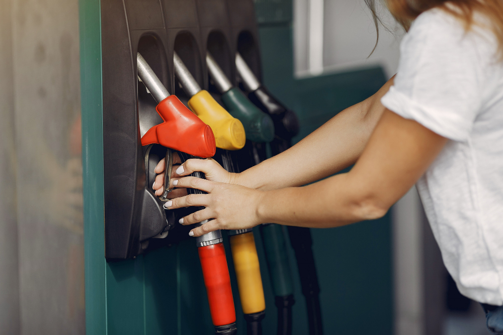 elegant-woman-standing-gas-station