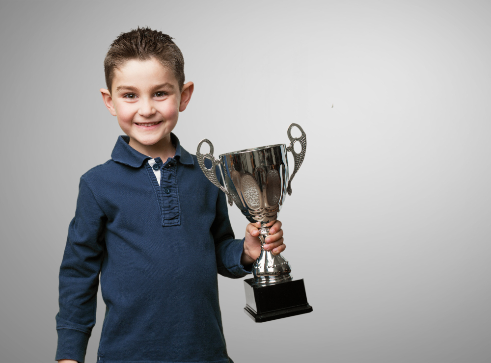 child-with-trophy