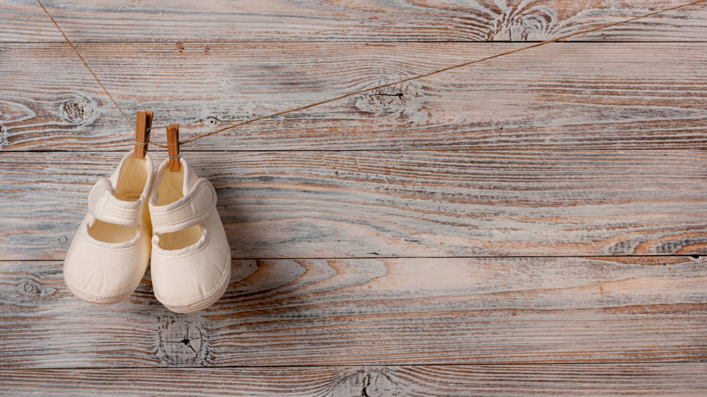 top-view-cute-little-baby-shoes